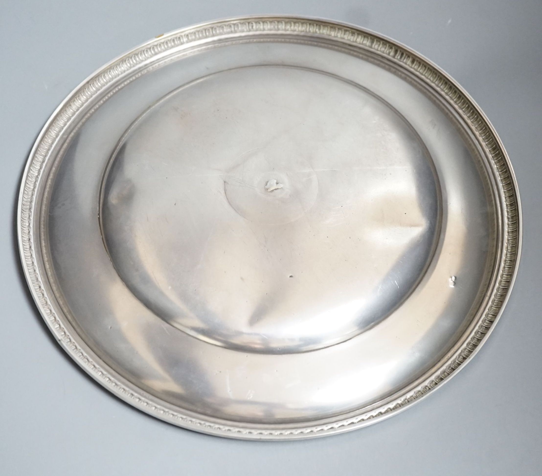 An Austro-Hungarian white metal circular dish with engraved swag decoration, 30cm, 11.5oz.